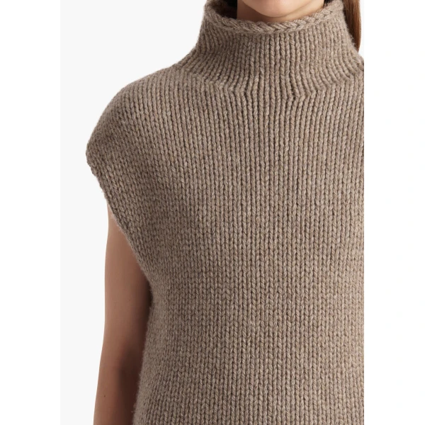 Elevate your elegance in this Khaite Tops   from the 2025 resort wear edit