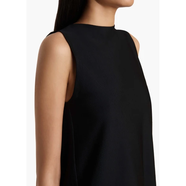 Elevate your elegance in this Khaite Tops   from the 2025 resort wear edit