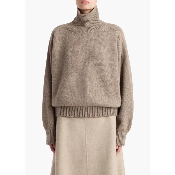 Elevate your elegance in this Khaite Knitwear   from the 2025 resort wear edit