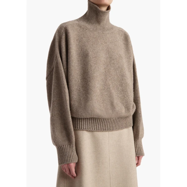 Elevate your elegance in this Khaite Knitwear   from the 2025 resort wear edit