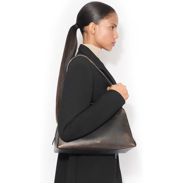 Alaïa Le Bouledogue Bag In Aged Leather - Alaia Bags - Laser Cut Luxury - Shop at Luxury Shoes 