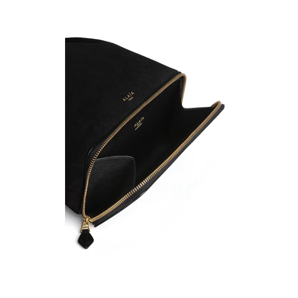 Alaïa Le Pochon Bag In Suede - Alaia Bags - Laser Cut Luxury - Shop at Luxury Shoes 