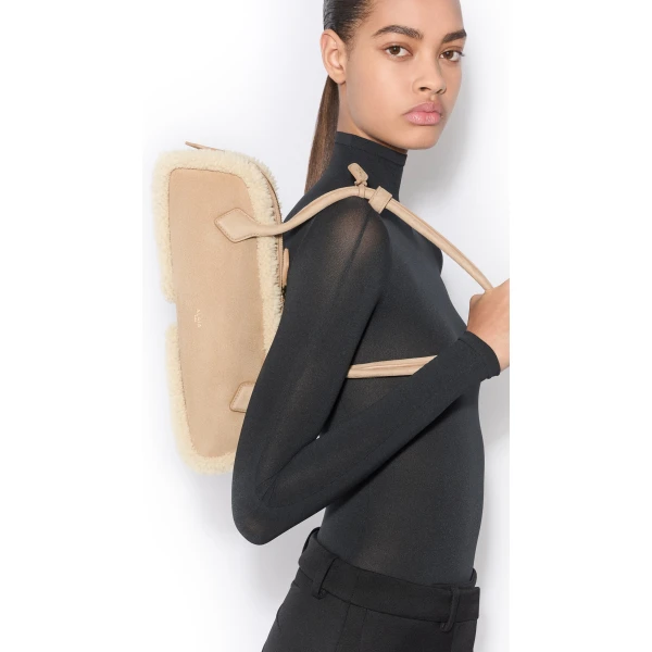 Alaïa Le Teckel Medium Bag In Merino Shearling - Alaia Bags - Laser Cut Luxury - Shop at Luxury Shoes 