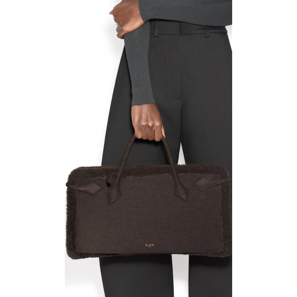 Alaïa Le Teckel Tote Bag In Merino Shearling - Alaia Bags - Laser Cut Luxury - Shop at Luxury Shoes 