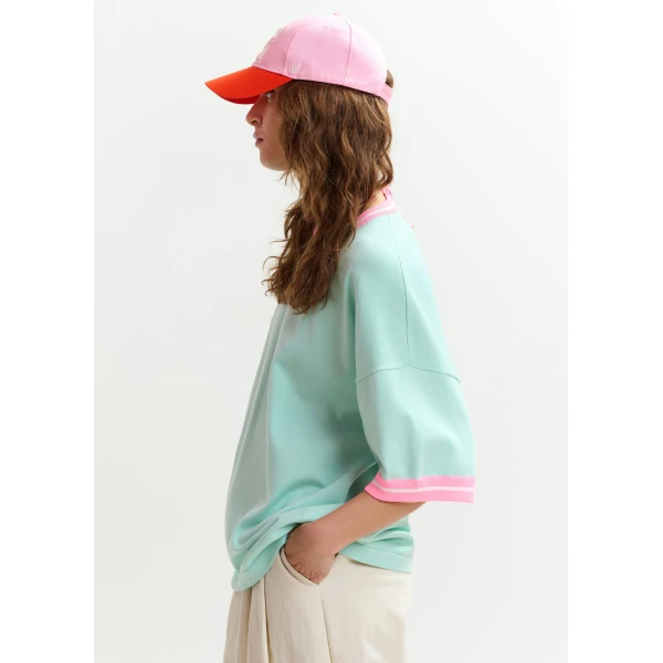 Essentiel Antwerp Light blue knit T-shirt with pink contrasting trim - Essentiel Antwerp Shirts - Colorful Belgian Design - Shop at Luxury Shoes 
