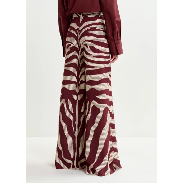 Essentiel Antwerp Off-white and burgundy zebra-print wide-leg pants - Essentiel Antwerp Pants - Colorful Belgian Design - Shop at Luxury Shoes 