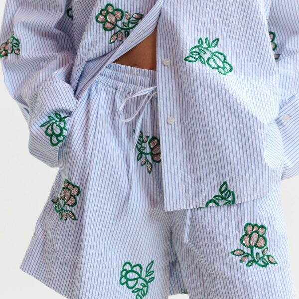 Essentiel Antwerp Off-white cotton mini shorts with light blue pinstriped embroidered with sequin and bead embellishments, view 3