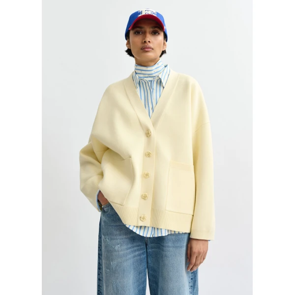 Essentiel Antwerp Off-white knit cardigan with tonal flower buttons - Essentiel Antwerp Knitwear - Colorful Belgian Design - Shop at Luxury Shoes 