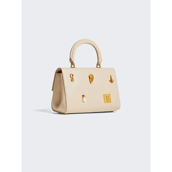 Schiaparelli nose bag