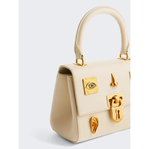 Schiaparelli nose bag