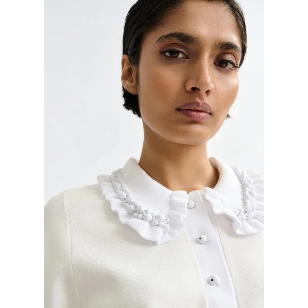 Essentiel Antwerp White ruffle fine-knit polo top with bead embellishments - Essentiel Antwerp Tops - Colorful Belgian Design - Shop at Luxury Shoes 