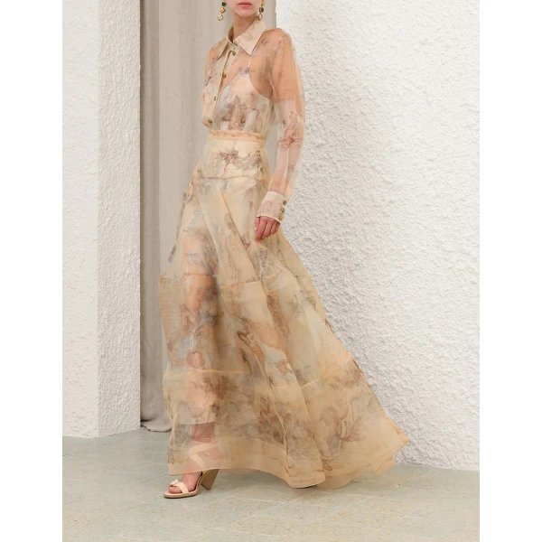 Elevate your elegance in this Zimmermann Tops   from the 2025 resort wear edit