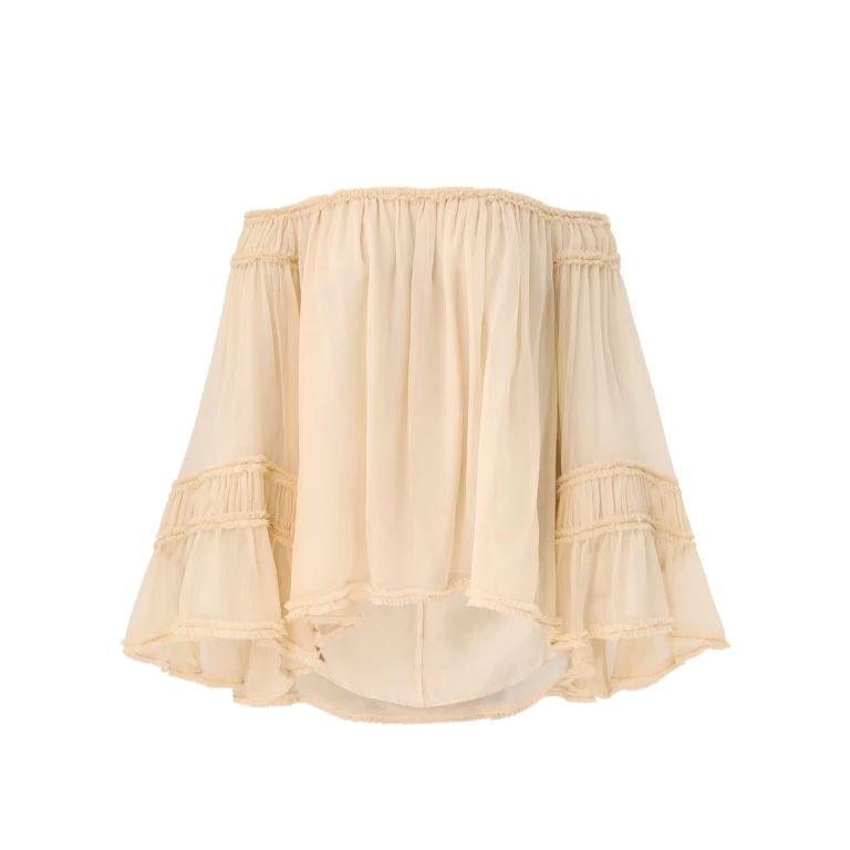 Elevate your elegance in this Zimmermann Tops   from the 2025 resort wear edit