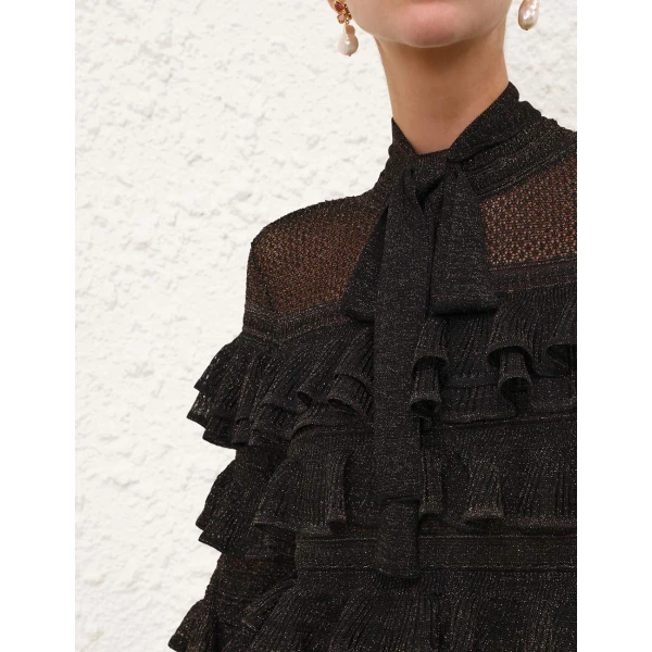 Elevate your elegance in this Zimmermann Tops   from the 2025 resort wear edit