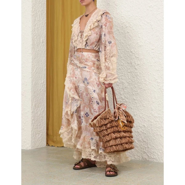 Elevate your elegance in this Zimmermann Tops   from the 2025 resort wear edit