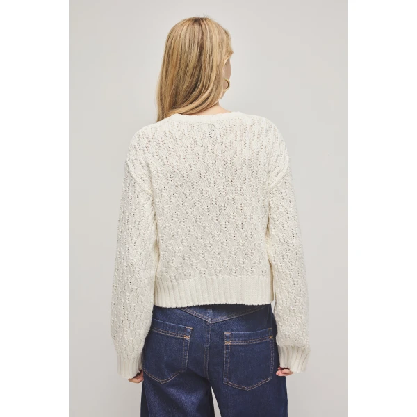 Aje Aus Knitwear – structured silhouette with raw femininity from Luxury Shoes 