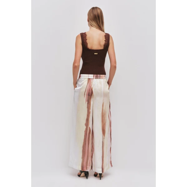 Aje Aus Pants – structured silhouette with raw femininity from Luxury Shoes 