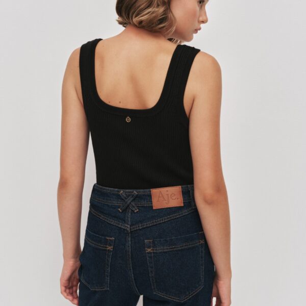 Aje Aus Pants – structured silhouette with raw femininity from Luxury Shoes 
