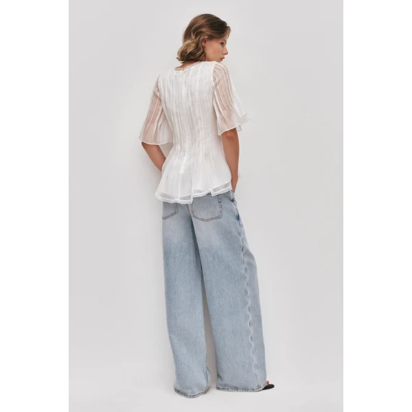 Aje Aus Tops – structured silhouette with raw femininity from Luxury Shoes 