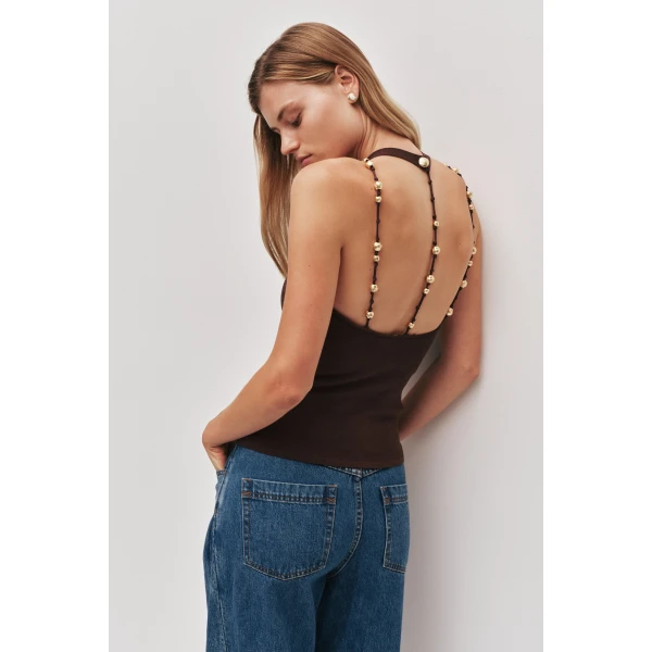 Aje Aus Tops – structured silhouette with raw femininity from Luxury Shoes 
