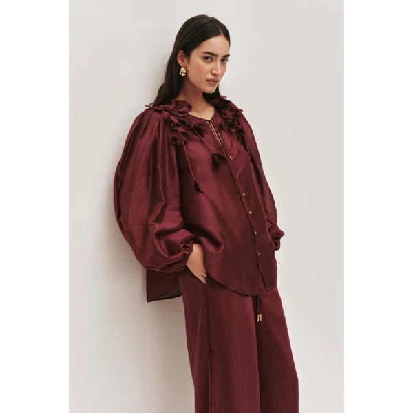 Aje Aus Tops – structured silhouette with raw femininity from Luxury Shoes 
