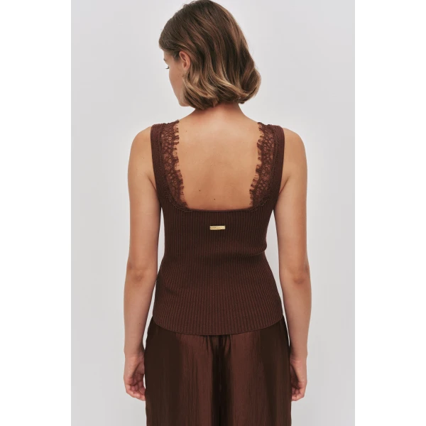 Aje Aus Tops – structured silhouette with raw femininity from Luxury Shoes 