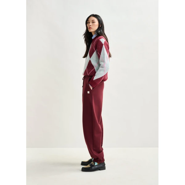 Essentiel Antwerp Burgundy cotton sweatpants with E-shaped embroidery - Essentiel Antwerp Pants - Colorful Belgian Design - Shop at Luxury Shoes 