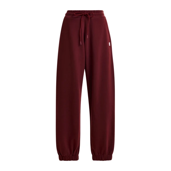 Essentiel Antwerp Burgundy cotton sweatpants with E-shaped embroidery - Essentiel Antwerp Pants - Colorful Belgian Design - Shop at Luxury Shoes 