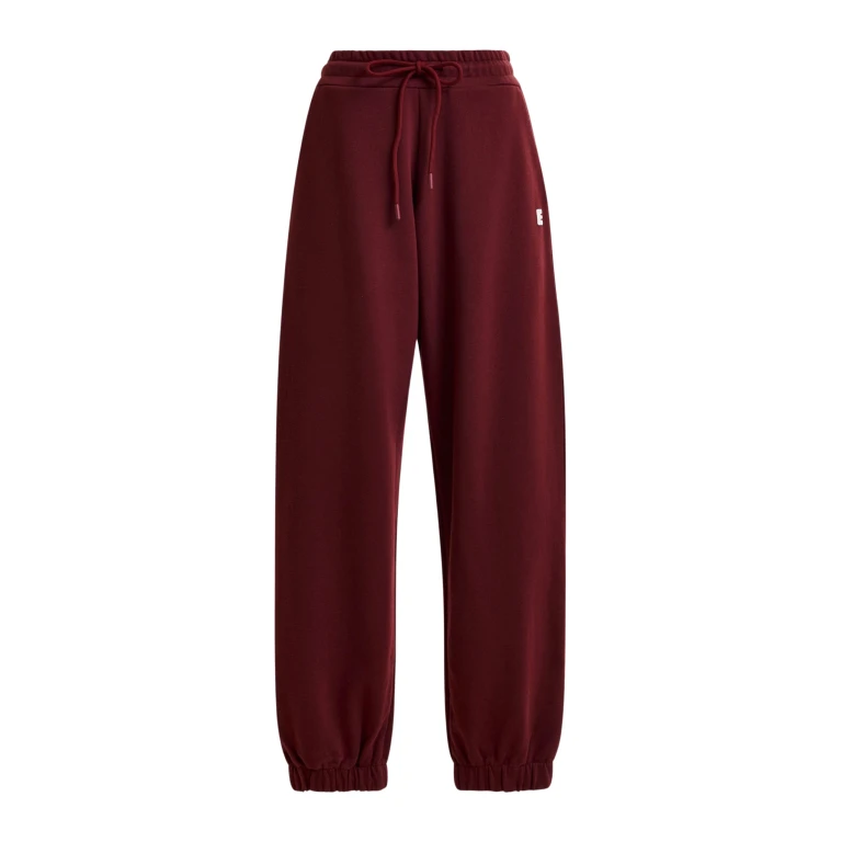 Essentiel Antwerp Burgundy cotton sweatpants with E-shaped embroidery - Essentiel Antwerp Pants - Colorful Belgian Design - Shop at Luxury Shoes 