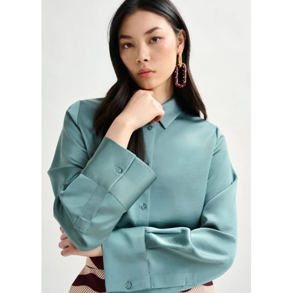 Essentiel Antwerp Light blue oversized satin shirt with button placket - Essentiel Antwerp Shirts - Colorful Belgian Design - Shop at Luxury Shoes 