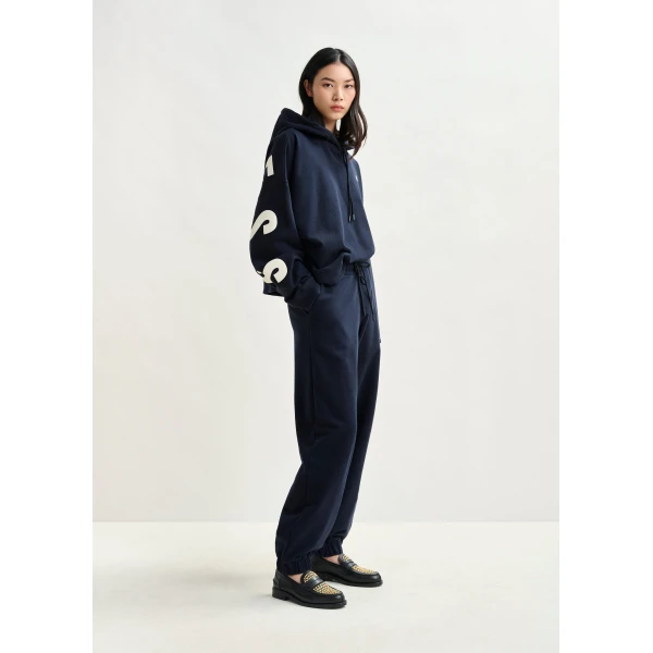 Essentiel Antwerp Navy cotton sweatpants with E-shaped embroidery - Essentiel Antwerp Pants - Colorful Belgian Design - Shop at Luxury Shoes 