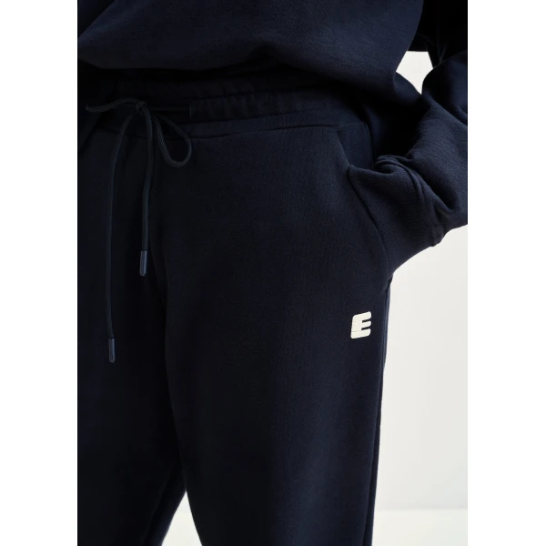 Essentiel Antwerp Navy cotton sweatpants with E-shaped embroidery - Essentiel Antwerp Pants - Colorful Belgian Design - Shop at Luxury Shoes 