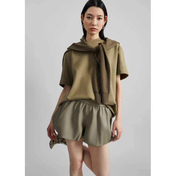 The Frankie Shop Alina Faux Leather Bubble Hem Shorts - Sage - Oversized Minimalist Shorts in Green - Shop at Luxury Shoes 