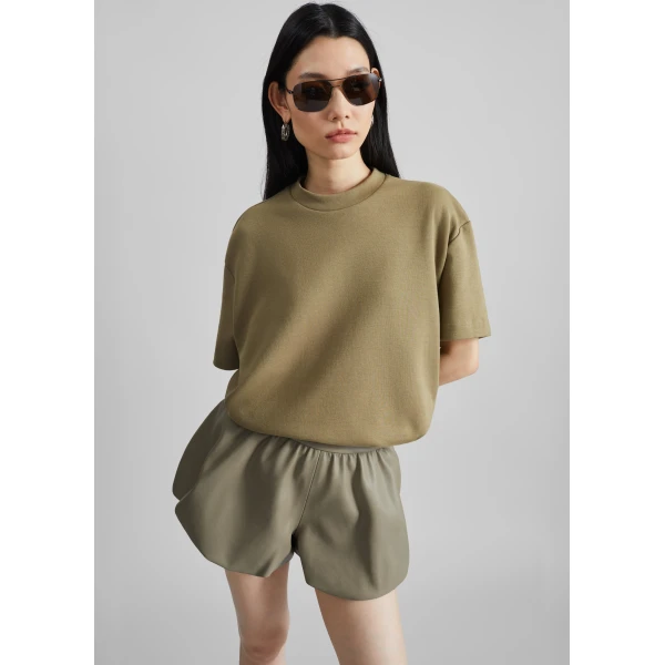 The Frankie Shop Alina Faux Leather Bubble Hem Shorts - Sage - Oversized Minimalist Shorts in Green - Shop at Luxury Shoes 