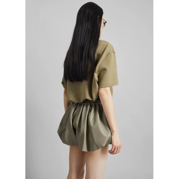 The Frankie Shop Alina Faux Leather Bubble Hem Shorts - Sage - Oversized Minimalist Shorts in Green - Shop at Luxury Shoes 