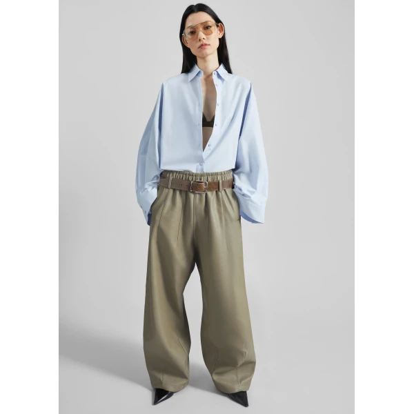 The Frankie Shop Oakdale Faux Leather Track Pants - Sage - Oversized Minimalist Pants in Green - Shop at Luxury Shoes 
