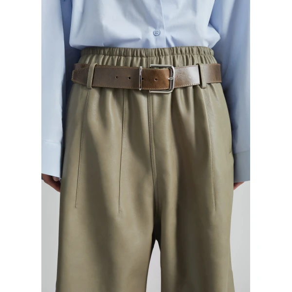 The Frankie Shop Oakdale Faux Leather Track Pants - Sage - Oversized Minimalist Pants in Green - Shop at Luxury Shoes 