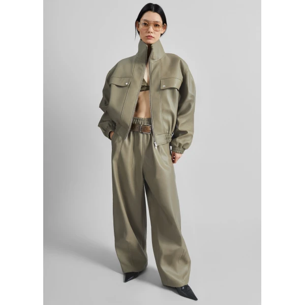 The Frankie Shop Oakdale Faux Leather Track Pants - Sage - Oversized Minimalist Pants in Green - Shop at Luxury Shoes 