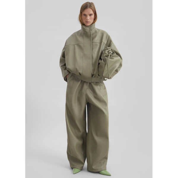 The Frankie Shop Oakdale Faux Leather Track Pants - Sage - Oversized Minimalist Pants in Green - Shop at Luxury Shoes 