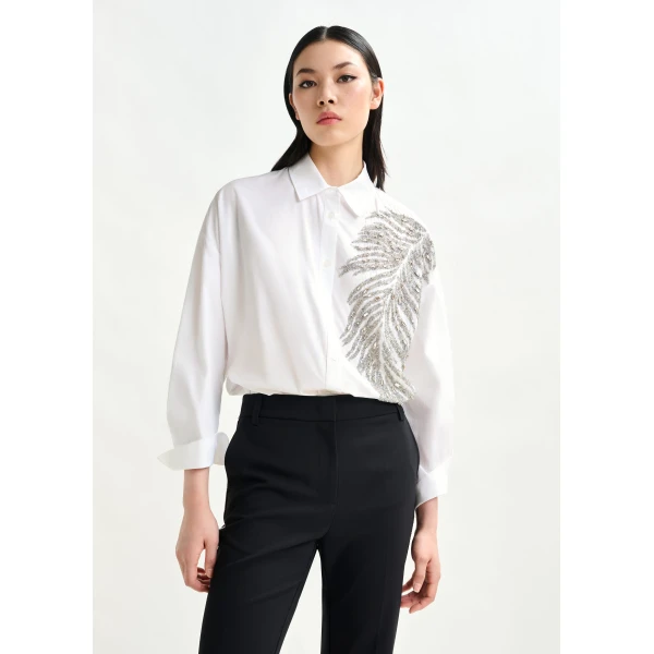 Essentiel Antwerp White and silver oversized cotton shirt with sequin and bead embellishment - Essentiel Antwerp Shirts - Colorful Belgian Design - Shop at Luxury Shoes 