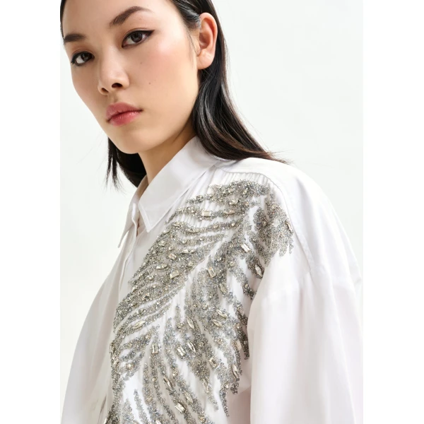 Essentiel Antwerp White and silver oversized cotton shirt with sequin and bead embellishment - Essentiel Antwerp Shirts - Colorful Belgian Design - Shop at Luxury Shoes 