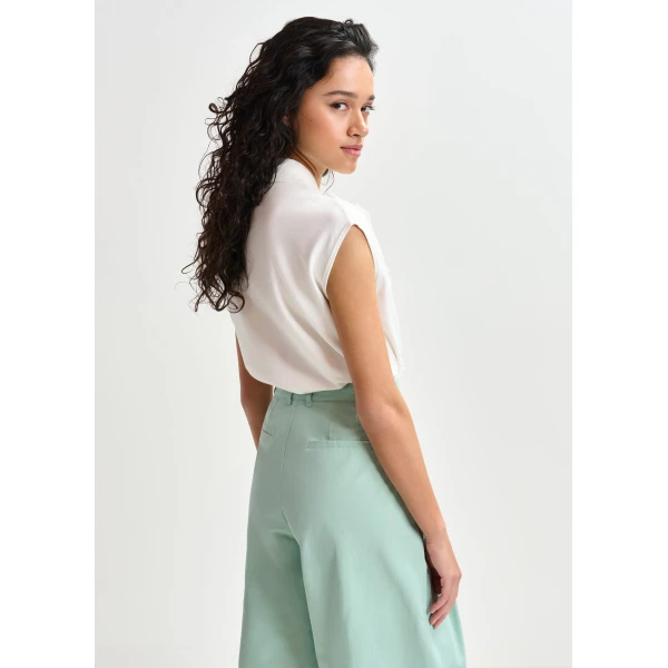 Essentiel Antwerp White sleeveless polo with lace details and pearl buttons - Essentiel Antwerp Tops - Colorful Belgian Design - Shop at Luxury Shoes 