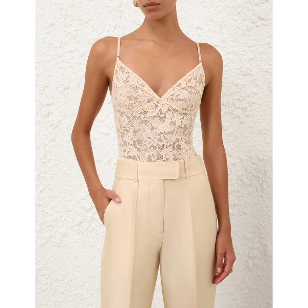 Elevate your elegance in this Zimmermann Bodysuit available now at Luxury Shoes 