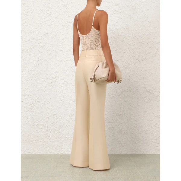 Elevate your elegance in this Zimmermann Bodysuit available now at Luxury Shoes 