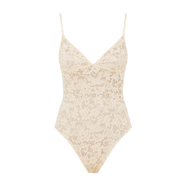 Elevate your elegance in this Zimmermann Bodysuit available now at Luxury Shoes 