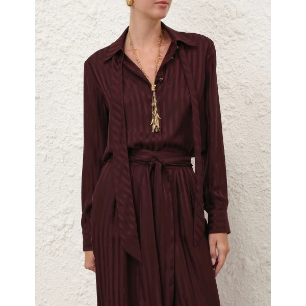 Elevate your elegance in this Zimmermann Tops available now at Luxury Shoes 