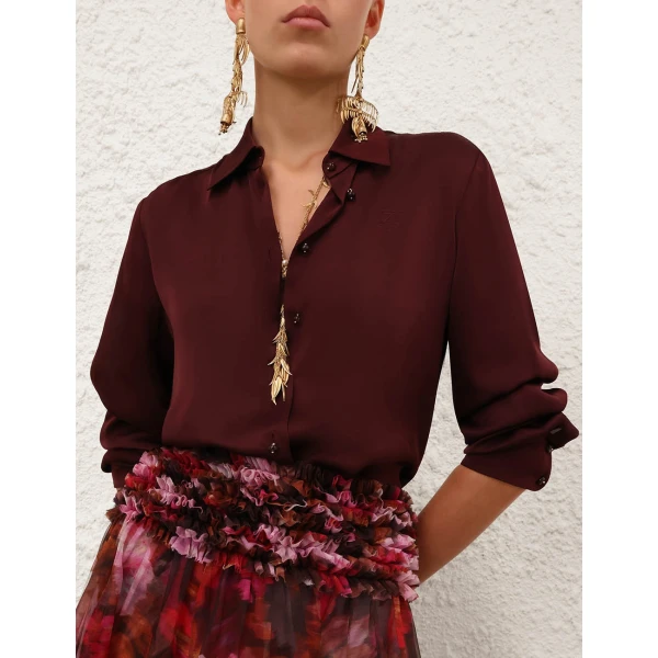 Elevate your elegance in this Zimmermann Tops available now at Luxury Shoes 