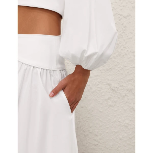Elevate your elegance in this Zimmermann Tops available now at Luxury Shoes 