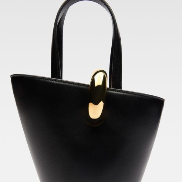 JACQUEMUS The small Bambola Asymmetric mini bucket bag., view 4