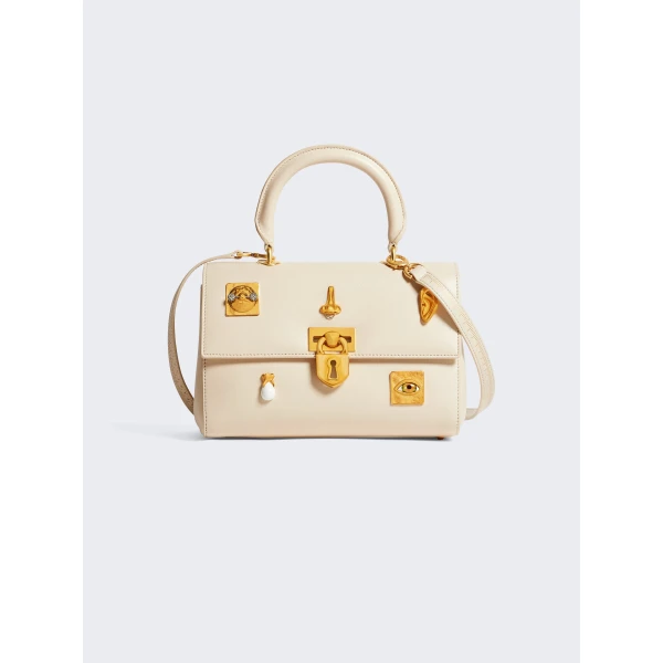 Schiaparelli nose bag